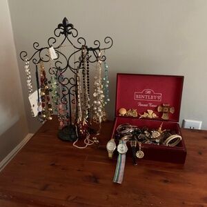Lot of costume jewelry, including watches and pieces new with tags